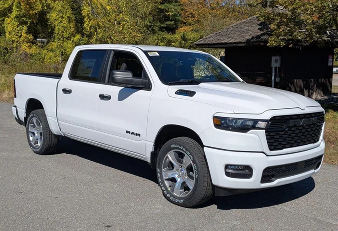 New 2025 RAM 1500 Tradesman Crew Cab white: An expert choice in the Dodge vs RAM Trucks comparison. Available today at Brattleboro CDJR, Vermont.